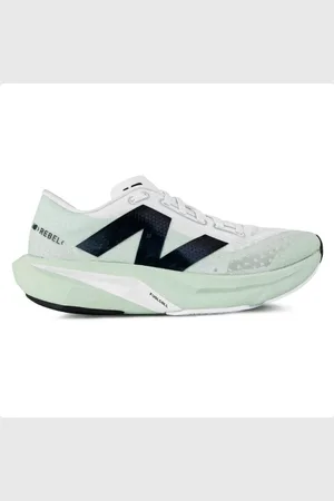New Balance Tenis Fuelcell Rebel V4 Feminino