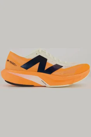 New Balance Tênis Fuelcell Rebel V4 Feminino Laran
