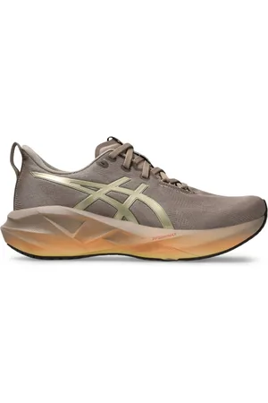 Asics Tênis Novablast 5 Luxe - Feminino - Dourado/
