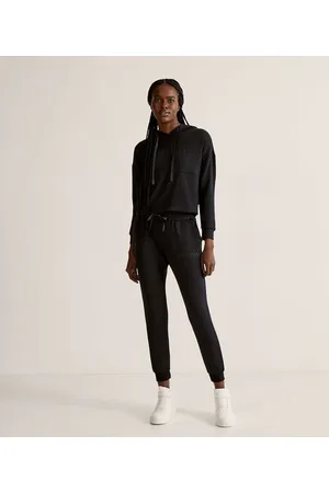 Get Over Calça Jogger Esportiva em Modal com Lettering Connected