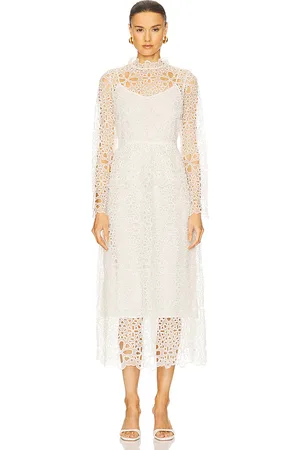 SEA Lumi Eyelet Peplum Long Sleeve Dress in . Size 00, 2, 4.