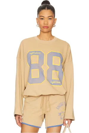 The Mayfair Group SWEATSHIRT ANGEL TRACK & FIELD VINTAGE LATTE in . Size M/L, S/M, XS.