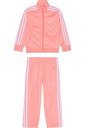 adidas JOGGINGANZUG FIREBIRD in . Size 2XS (5-6 years), 5T, XS (7-8 years).