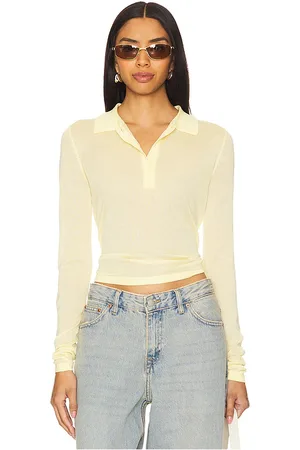 Lioness Black Swan Polo Top in . Size S.